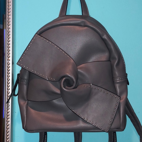 Jessica Simpson Handbags - Jessica Simpson Kandiss Studded Bow Mini Backpack